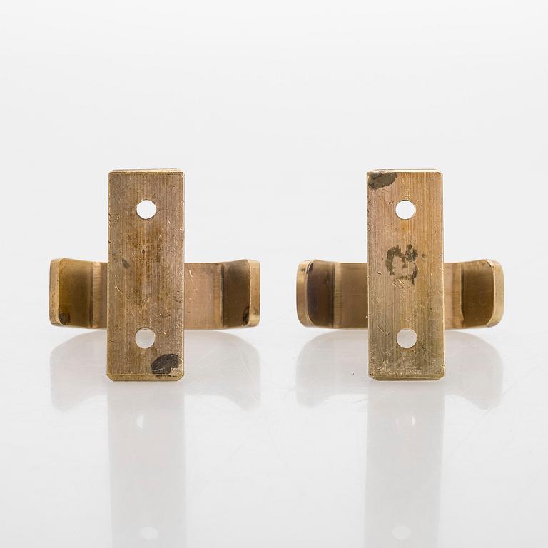 A set of 19 coat hooks, 1960s/70s.