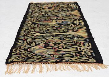 A sled cushion, Skåne, early 20th century, c. 144 x 57 cm.