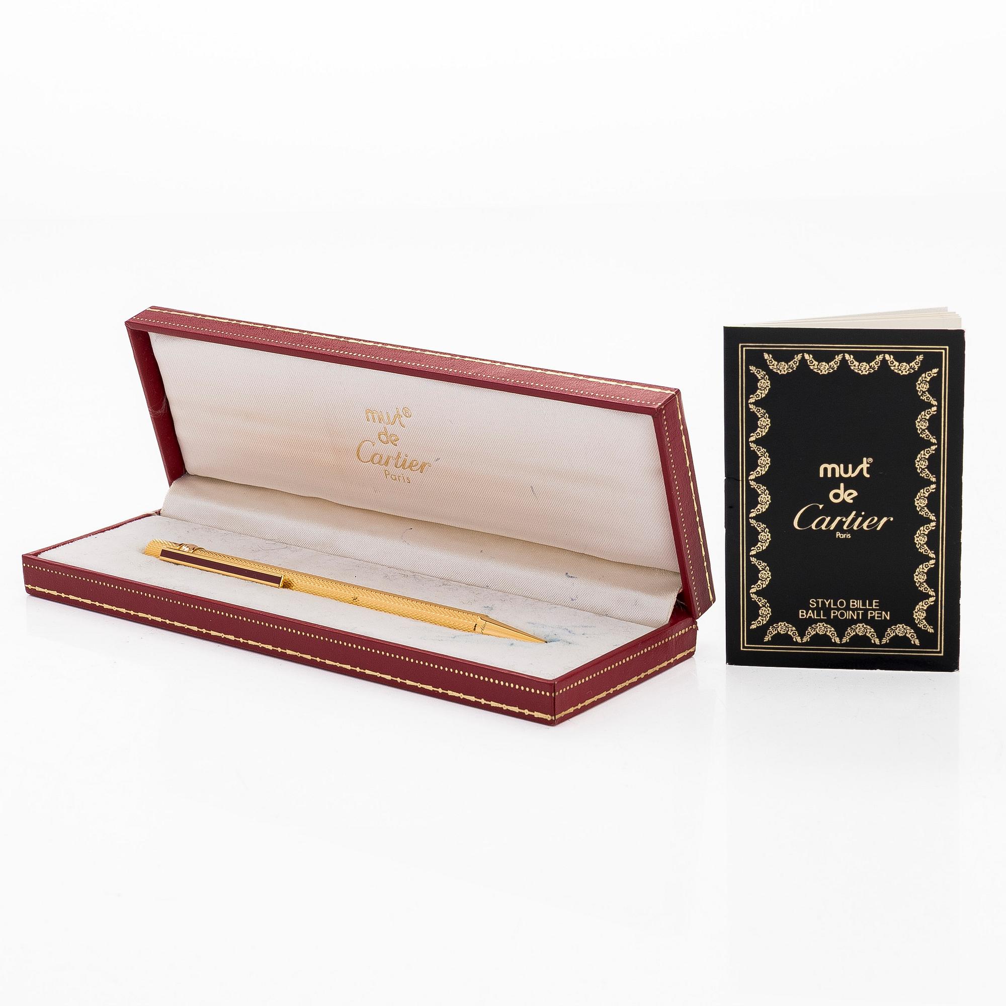 Cartier, must de Cartier, a "Trinity" ballpoint pen.