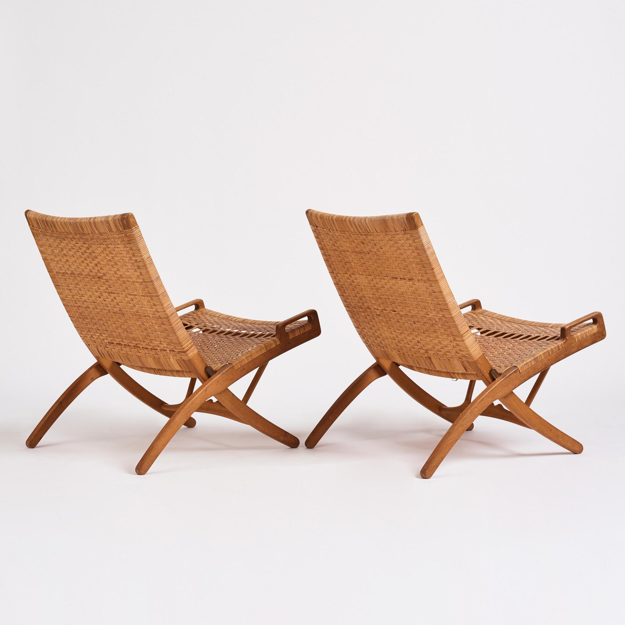 Hans J. Wegner, a pair of oak and rattan folding chairs 'JH-512', Johannes Hansen, Denmark 1950-60s.