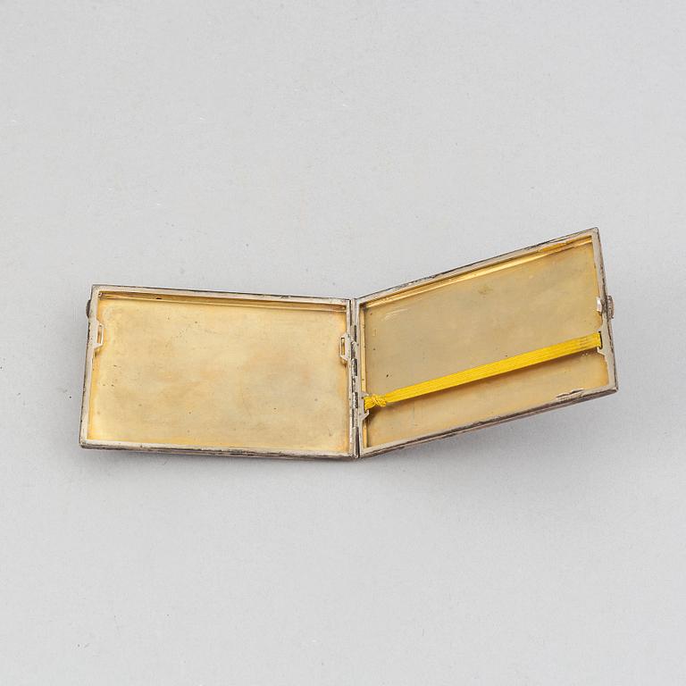 A Viennese silver cigarette case with a minature painting, Austria, around the year 1900.