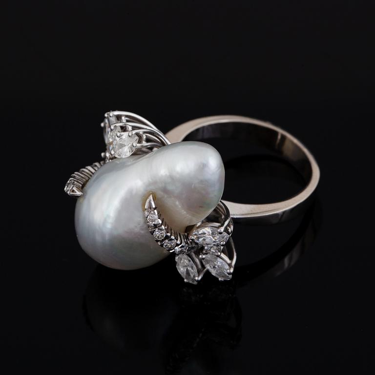 Baroque pearl and navette-cut and brilliant-cut diamond ring.