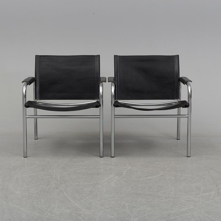 TORD BJÖRKLUND, a pair of 'Klinte' tubular steel easy chairs from IKEA.
