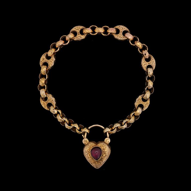 A cabochon cut garnet gold bracelet, 19th century.