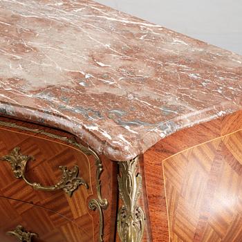 A pair of rococo style chest of drawers, mid 20th Century.