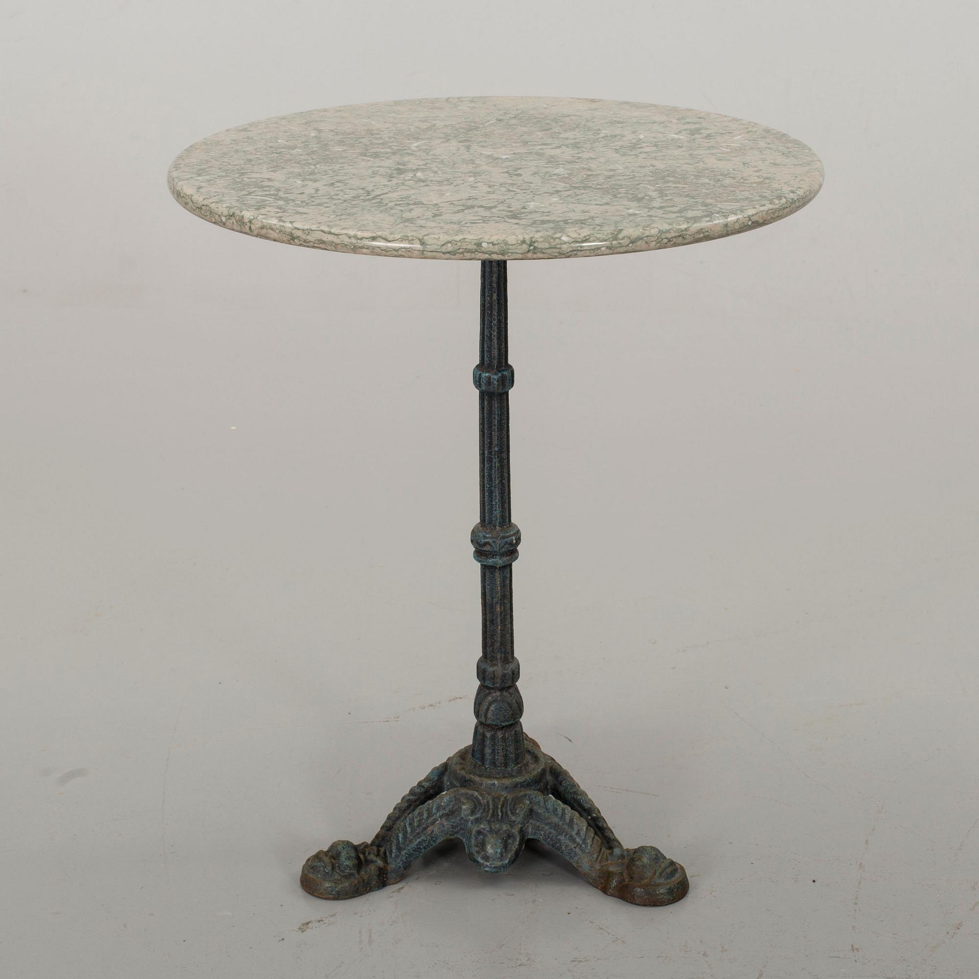 A IRON GARDEN TABLE.