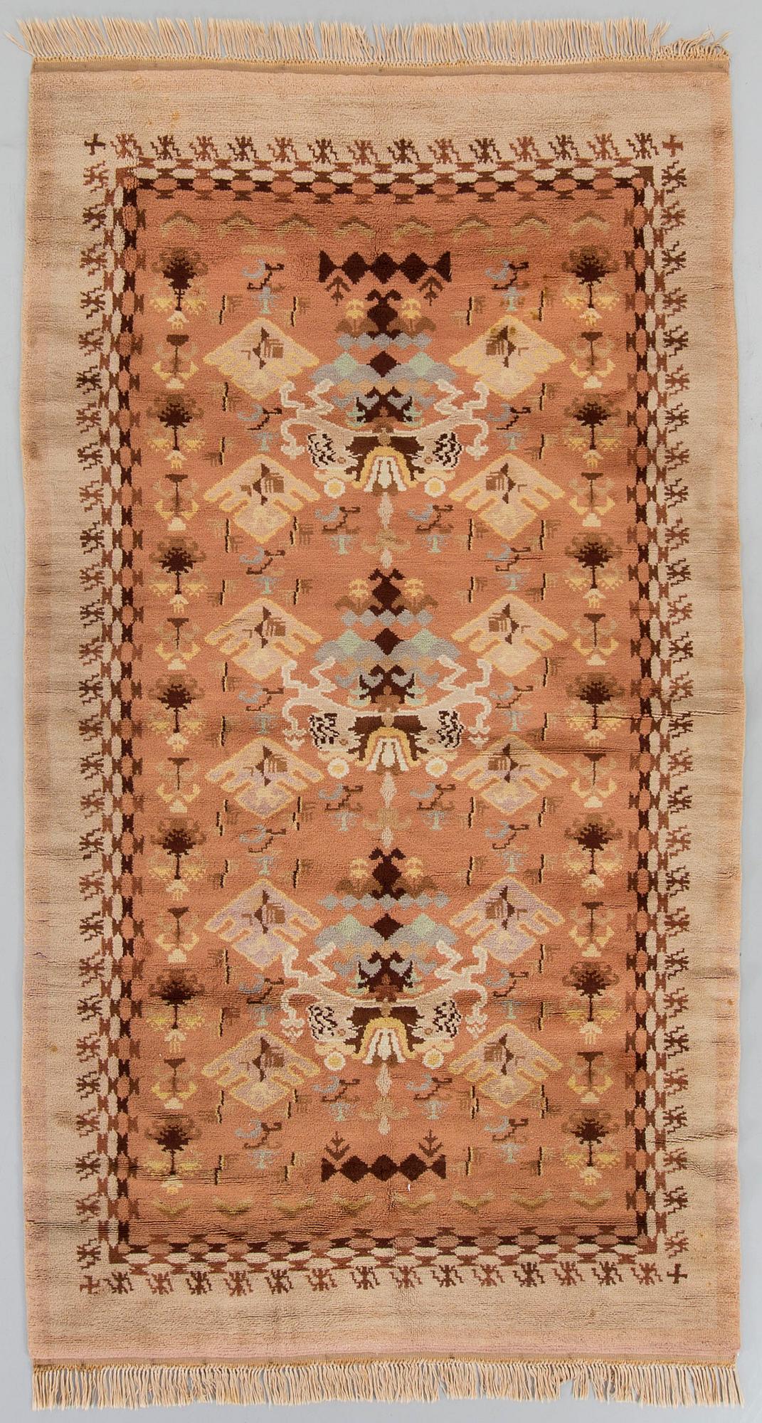 A Scandinavian knotted pile rug  1940/50 ca 303 x 169 cm.
