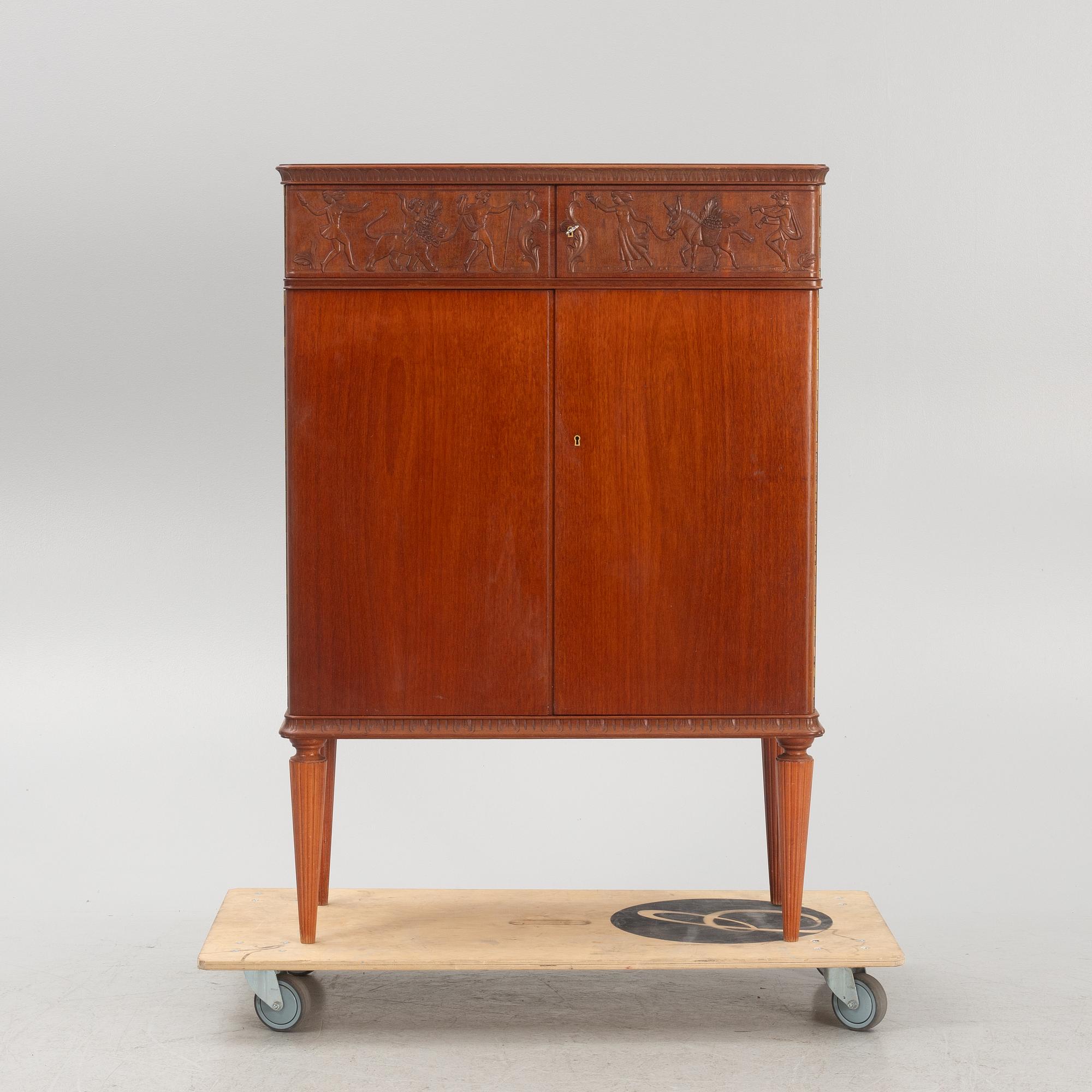 A cabinet, mid 20th Century.
