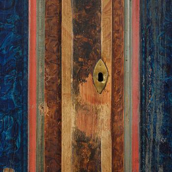 A polychrome-painted folk art cabinet from Värmland, Sweden, dated 1818.