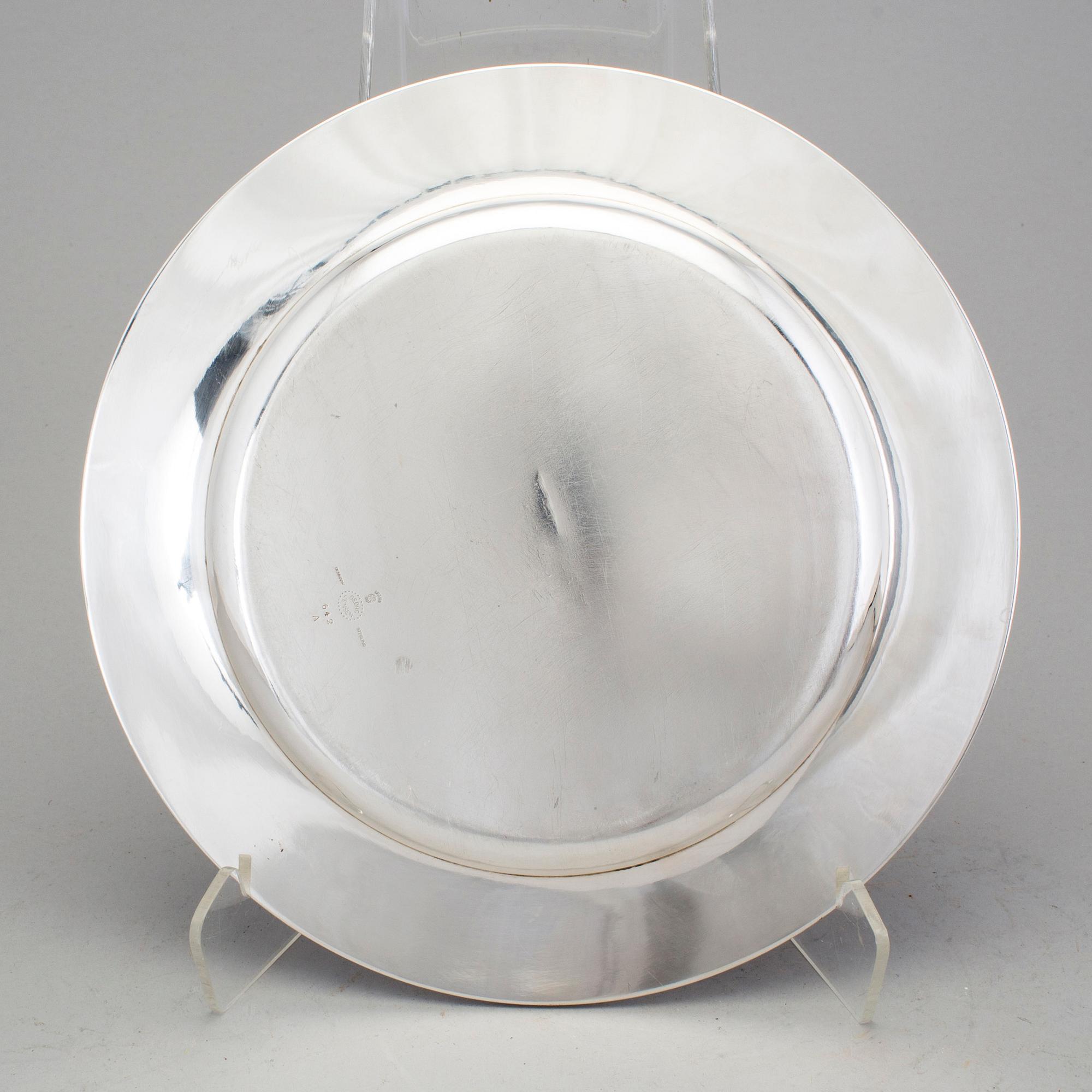 a sterling silver plate designed by Johan Rohde model Acorn 642A for Georg Jensen. After 1945. Weight ca 676 gram.