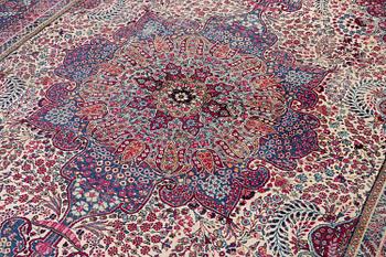 A semi-antique Kirman carpet, South Persia, c. 380 x 289 cm.
