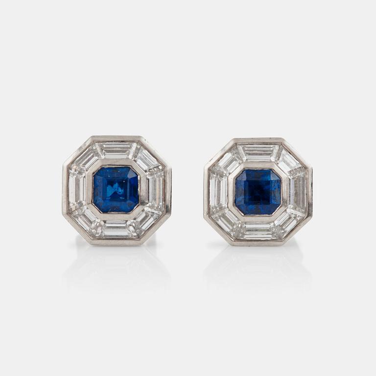 A pair of sapphire and step-cut diamond earrings. Total carat weight of diamonds circa 2.00 cts.