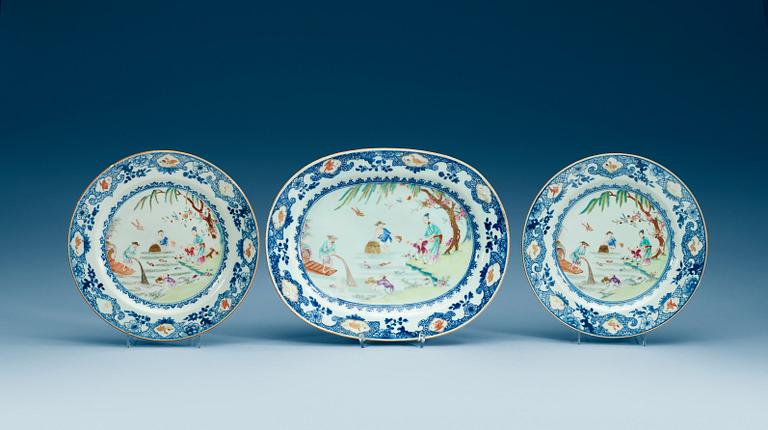 A famille rose serving dish and two dinner plates, Qing dynasty, Qianlong (1736-95).