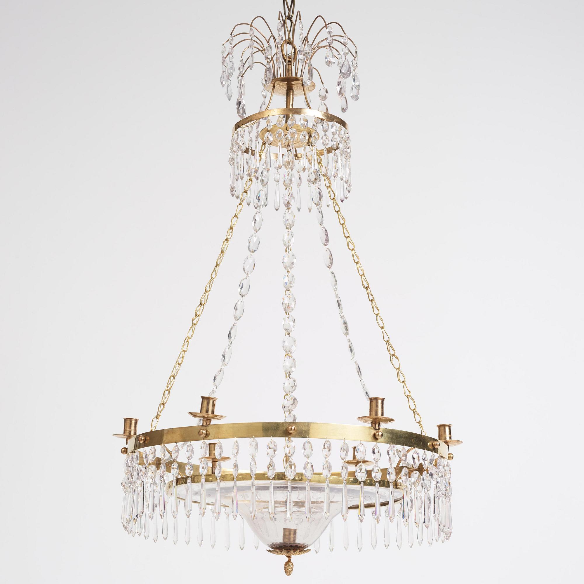 A late Gustavian gilt brass and cut glass seven-light chandelier, late 18th century.