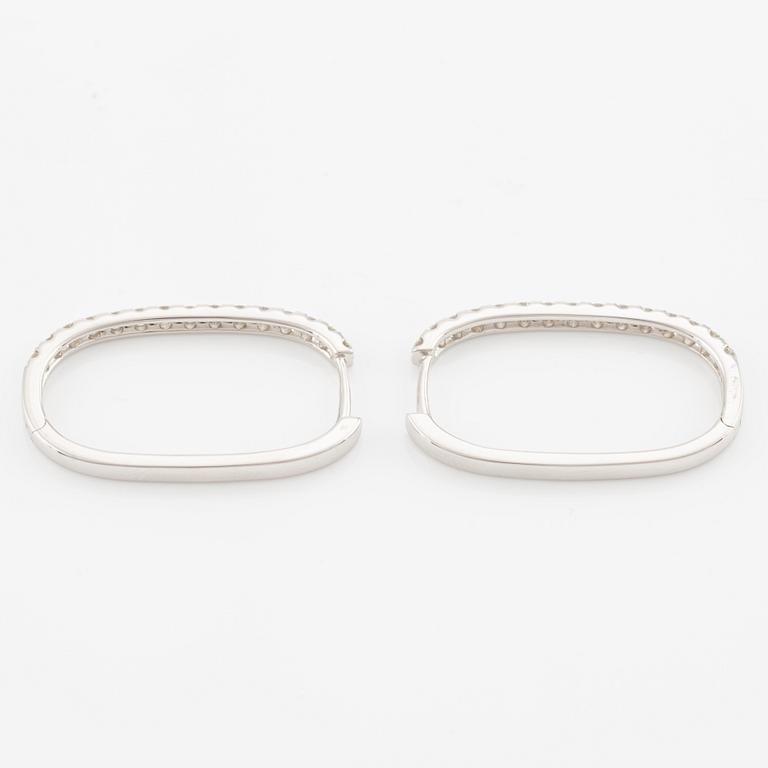 Earrings with brilliant-cut diamonds.