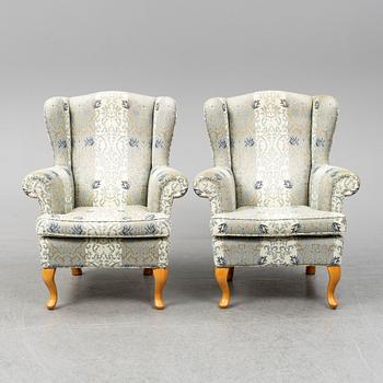 A pair of late 20th century easy chairs.