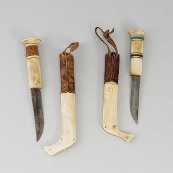 ERIK TUOLJA, two Sami reindeer horn knives, signed ET.