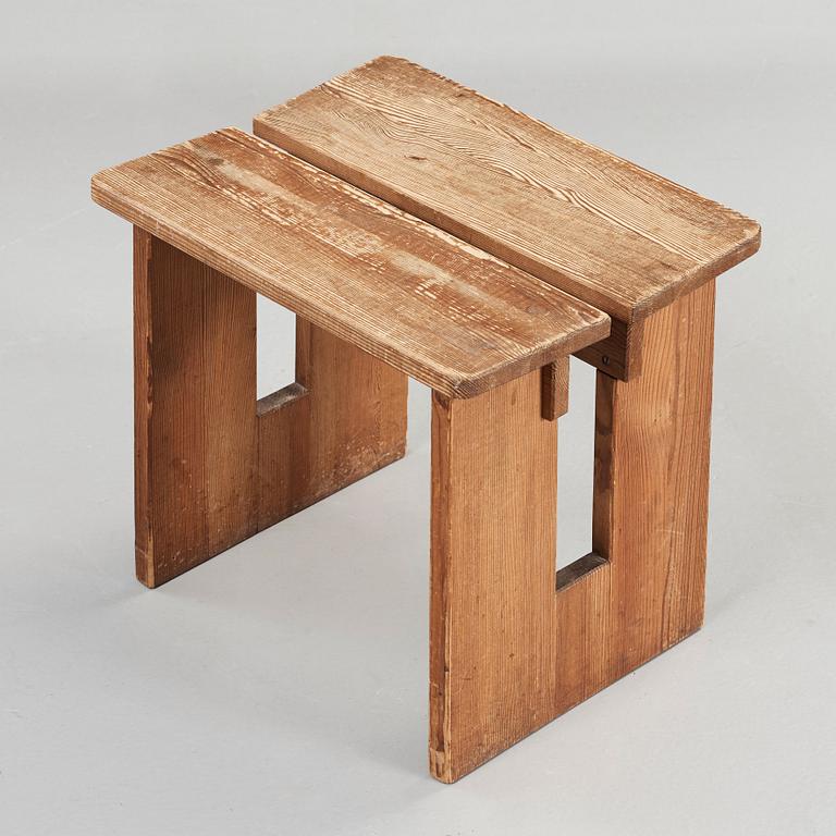 An Axel Einar Hjorth stained pine stool, Nordiska Kompaniet, Sweden 1930's.