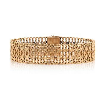 516. An 18K gold bracelet by CF Carlman.