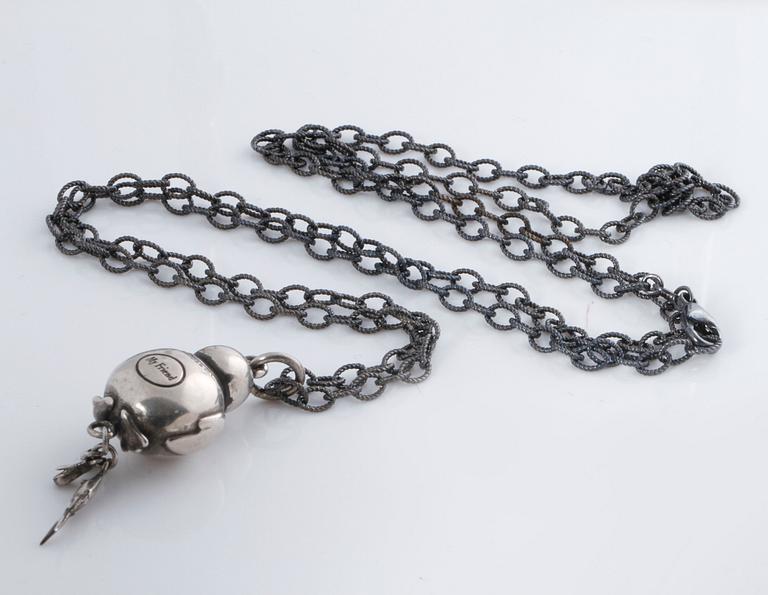 A pendant, "My friend" by Ole Lynggaard.
