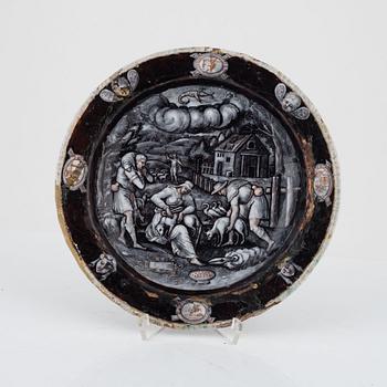 A Limoges grisaille enamel plate representing the month of June in the manner of Jean Miette, 16th/17th century.