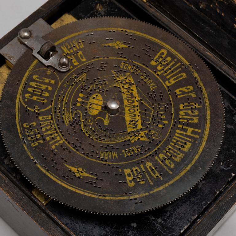 A GERMAN MUSICAL BOX, with 23 songs, 19th century.