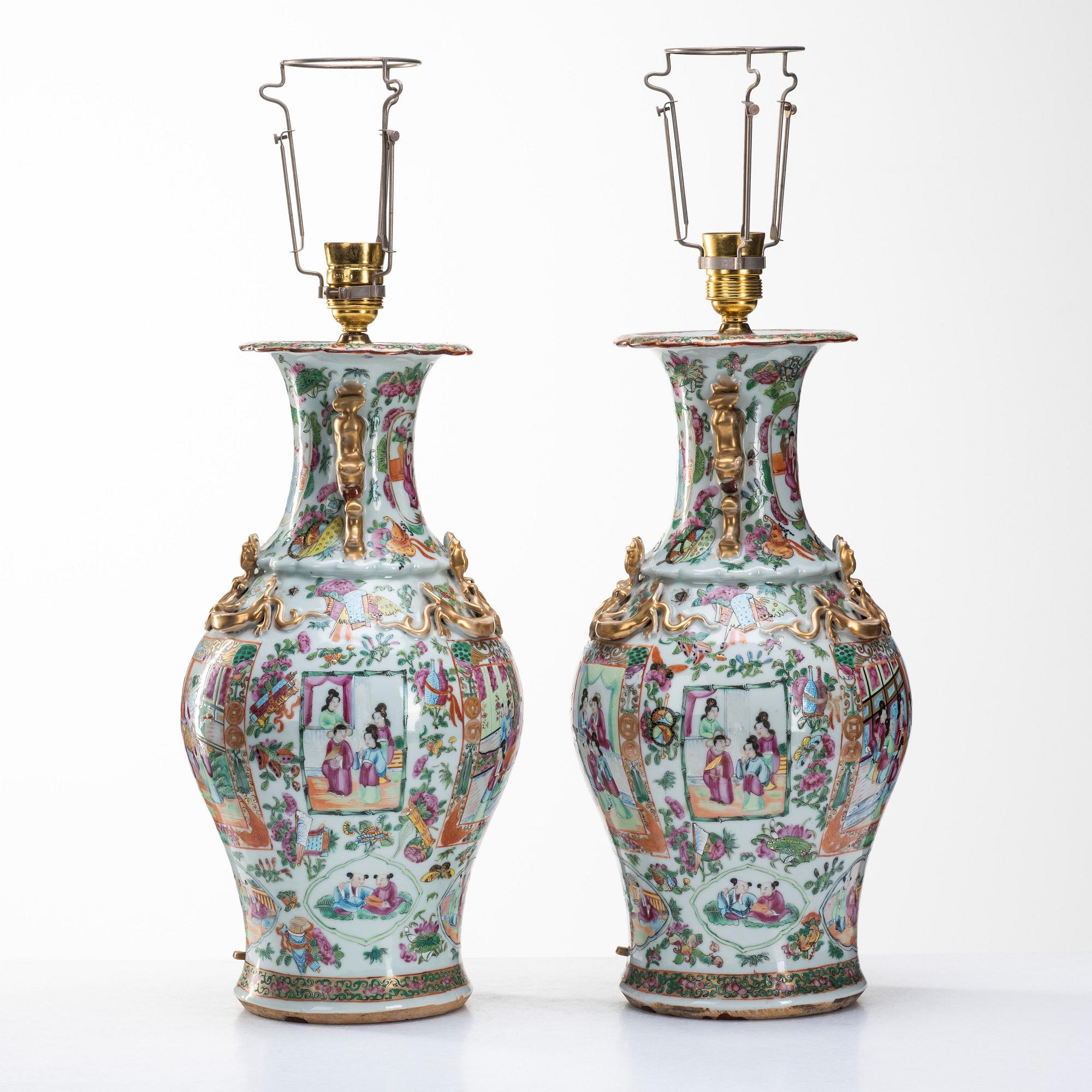A pair of famille rose Canton vases made in to lamps, Qing dynasty, 19th Century.