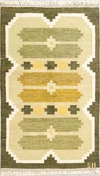 Flat-weave rug signed SH, approximately 194x133 cm.