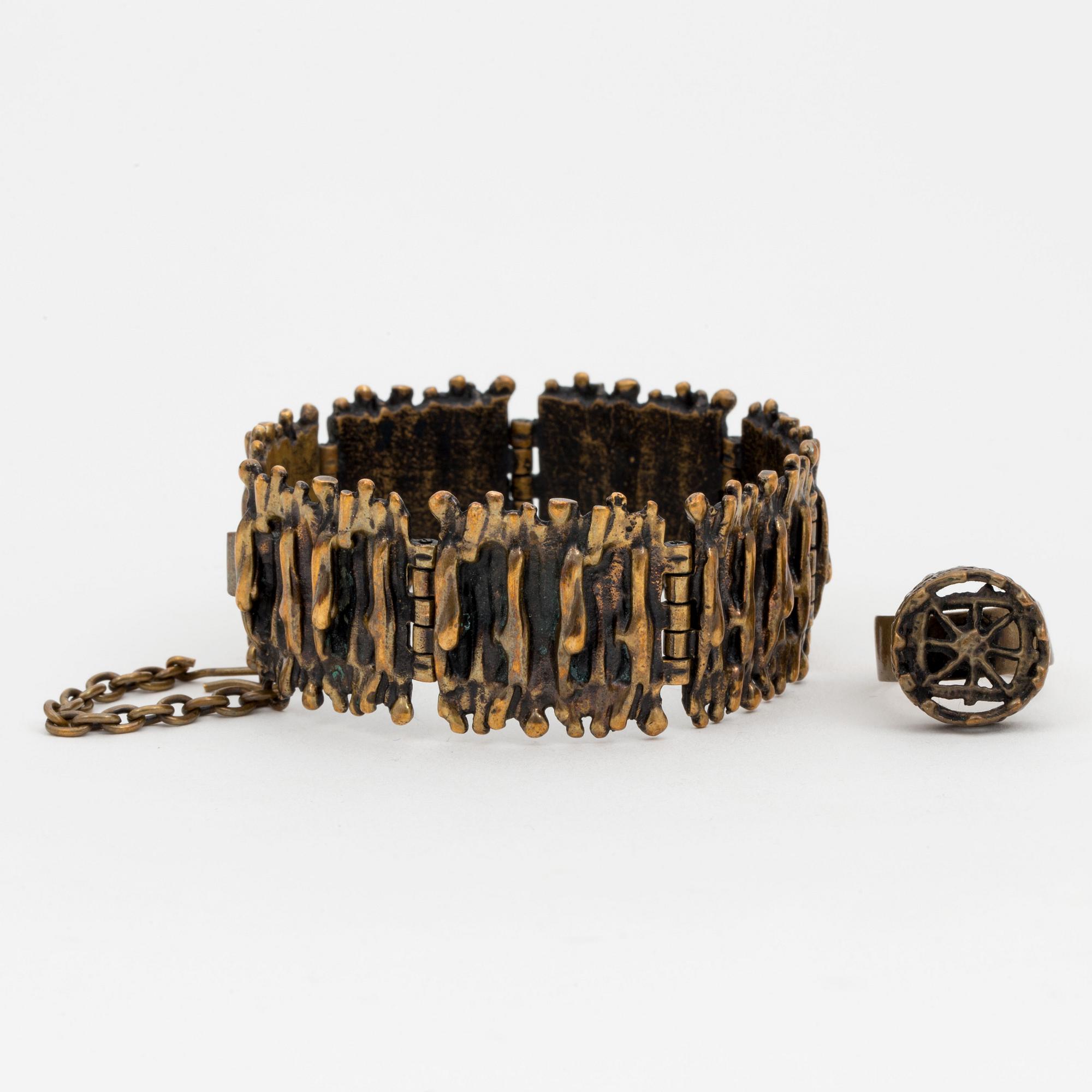 A bronze bracelet, ring and a pair of earrings by Pentti Sarpaneva, Finland.