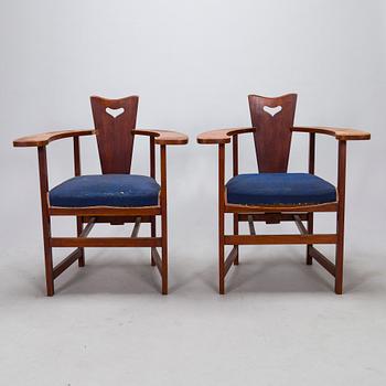 A pair of Arts and Crafts armchairs, early 20th century.