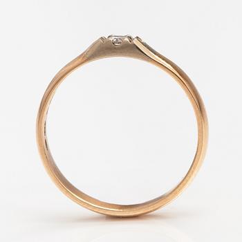 A 14K gold ring with a ca. 0.10 ct diamond. Finland 1993.