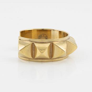 Hermès, a vintage gold tone stud bangle.