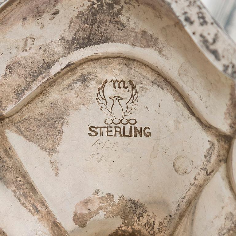 A five-piece sterling silver coffee and tea service, and 12 spoons, USA, first quarter of the 20th century.