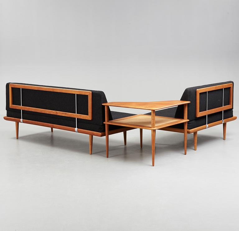 A set of two Danish 'Minerva' sofas with a table for France & Daverkosen.