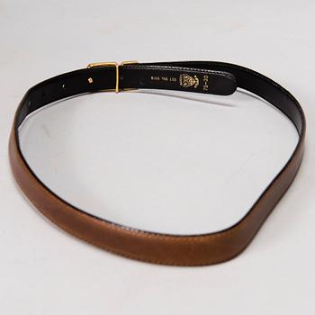 GUCCI Silk Blouse and a Leather Belt.