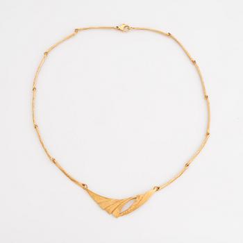 18K gold necklace.