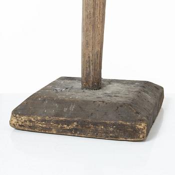 A candle stick, 19th/20th Century.