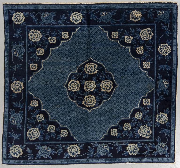 A rug, semi-antique Baotou, ca 168 x 179 cm.