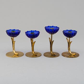 GUNNAR ANDER, 8 brass candlesticks. Ystad Metall, mid 20th century.