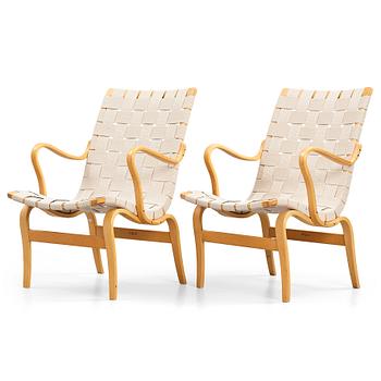 56. Bruno Mathsson, a pair of bent beech wood and textile girths 'Eva' lounge chairs, Firma Karl Mathsson, Sweden 1967.