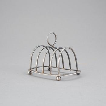 BRÖDSTÄLL, s k Toast rack, silver, London, 1887-88-tal. Vikt 64 g.