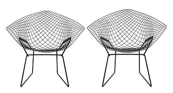 678. A pair of Harry Bertoia black metal "Diamond Chair".