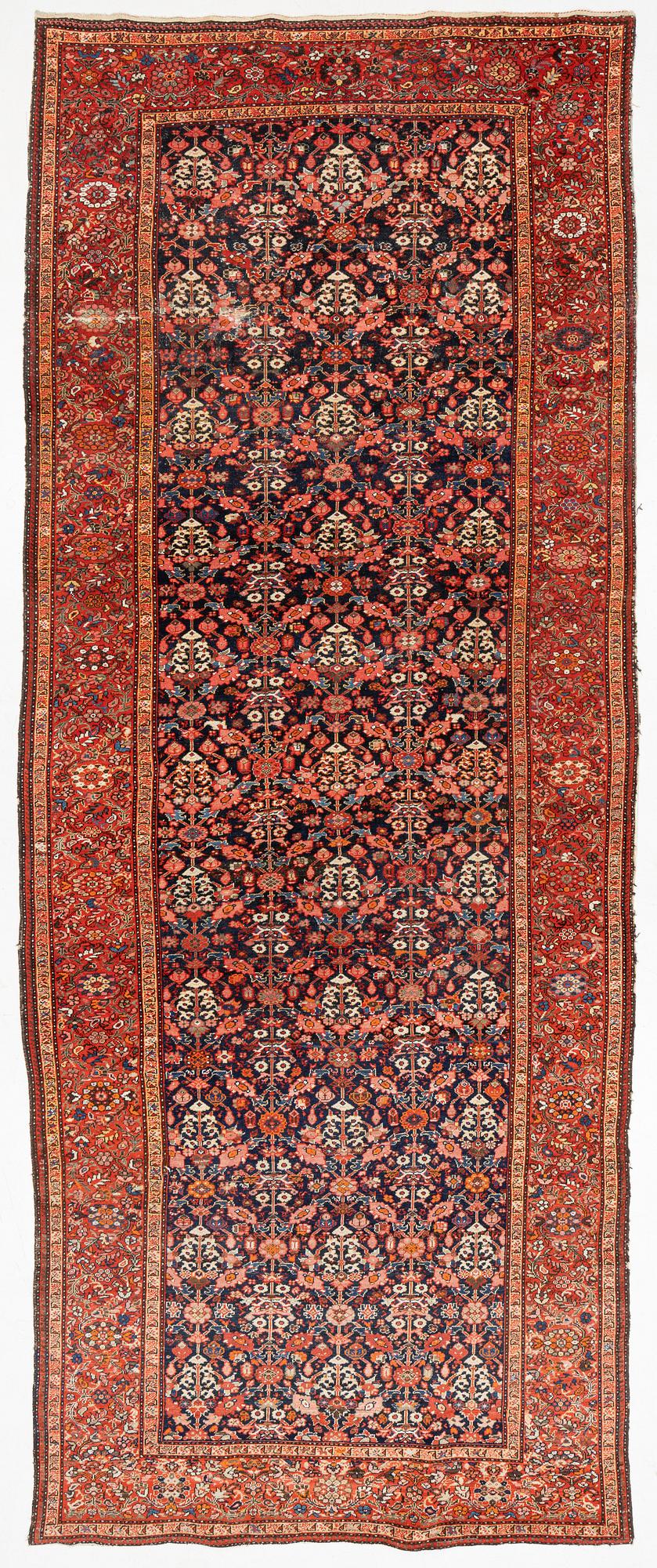 A Farahan carpet, c. 520 x 205 cm.