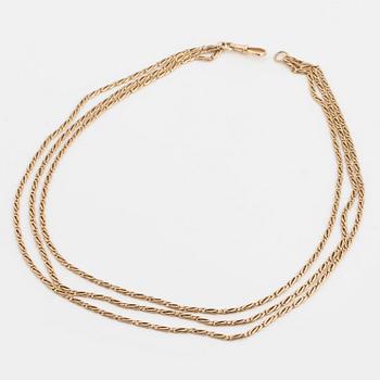 A fancy-link watch chain.