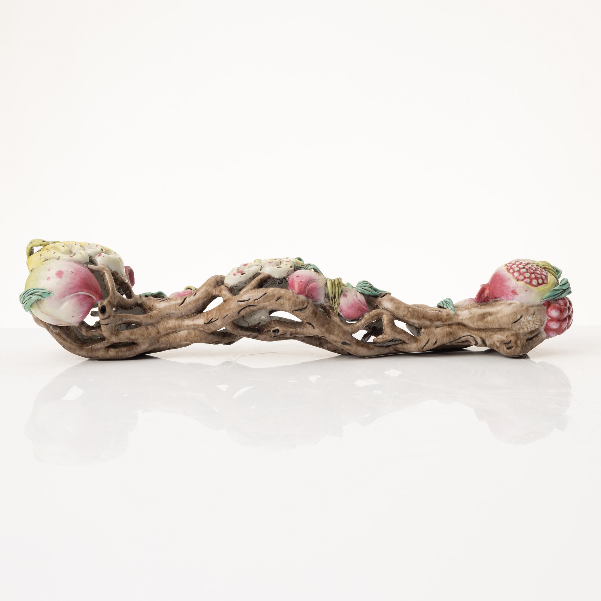 A Chinese porcelain ruyi-sceptre, late 20th century.
