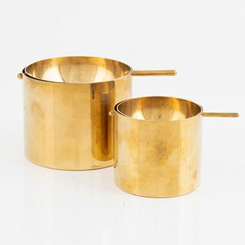 Arne Jacobsen, 2 brass ashtrays.