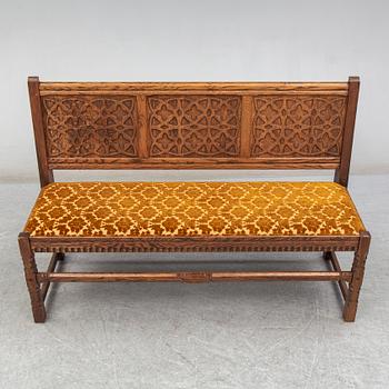 A 20th century renaissance style sofa.