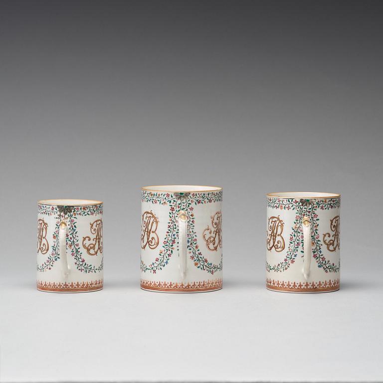 A group of three famille rose armorial jugs, Qing dynasty, Qianlong (1736-95).