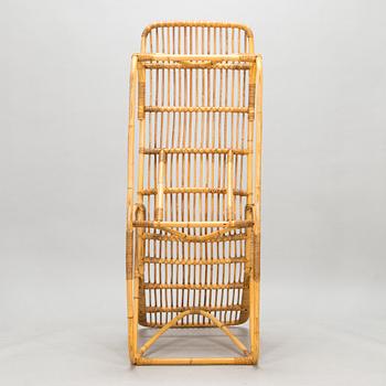 A rattan lounger, mid-20th century.