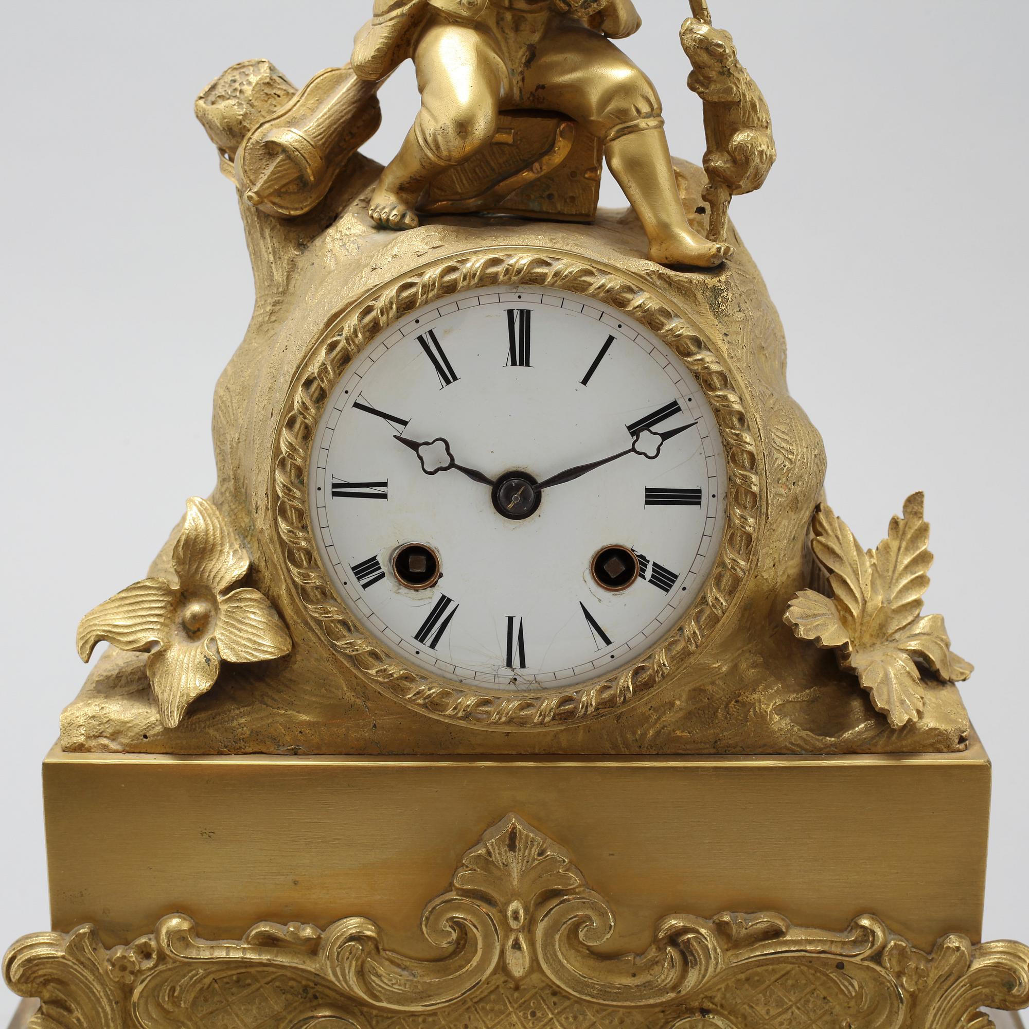 A late Empire table clock, clockwork marked "Japy Freres", made in the mid/second half of the 20th century.